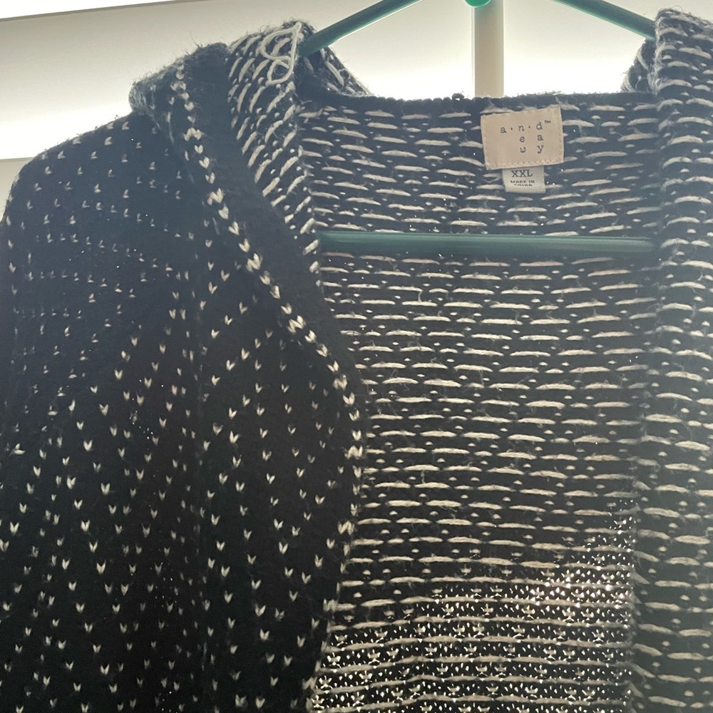 Hooded black and white sweater